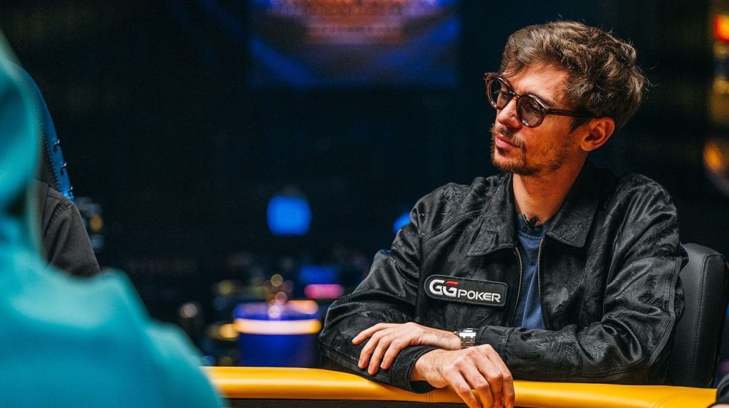 Podcast screen showing a Triton final table hand: big blind 9♦4♦ vs cutoff K♣2♣ on Q♠7♦3♦4♠3♣ with a 1,390,000 chip pot, host Jon Jaffe and guest Fedor Holz visible on the left.