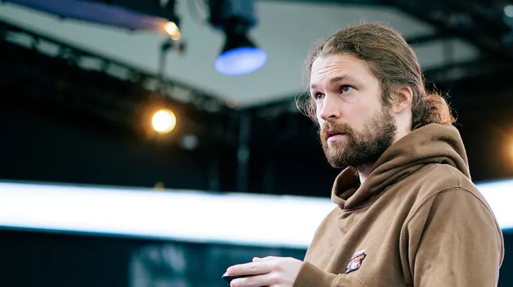 Ben Heath in a brown hoodie, looking thoughtfully during the EPT Malta Main Event
