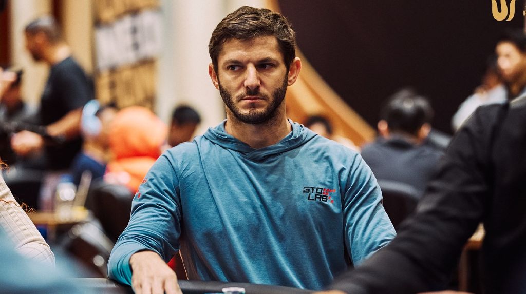 Jon Jaffe seated at a poker table