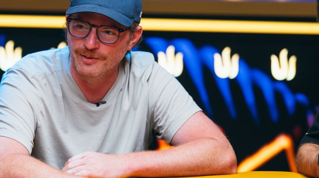 Nick Petrangelo focuses during a Triton poker hand, demonstrating advanced bluff catching strategy at the table.